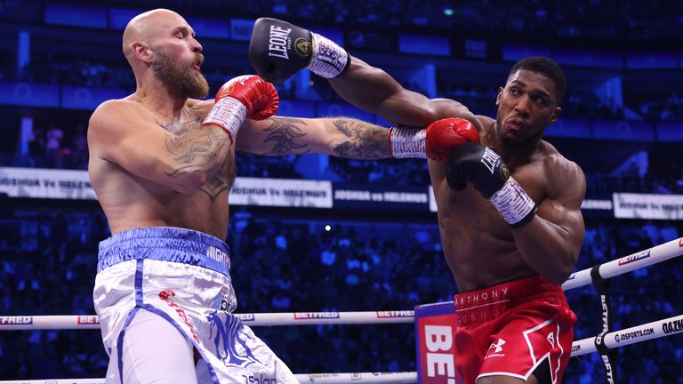 Former heavyweight champion Joshua finishes Helenius in seven